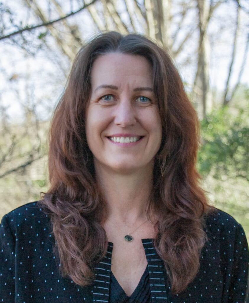 A headshot of Mary Newman.